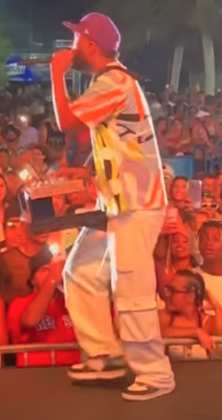 DJ using an AKAI MPC with a Walkabout wearable carrier